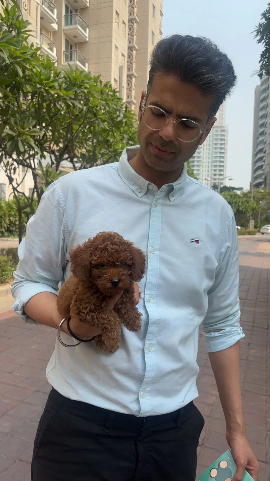 Happy customer with puppy at Kyra Pet Shop
