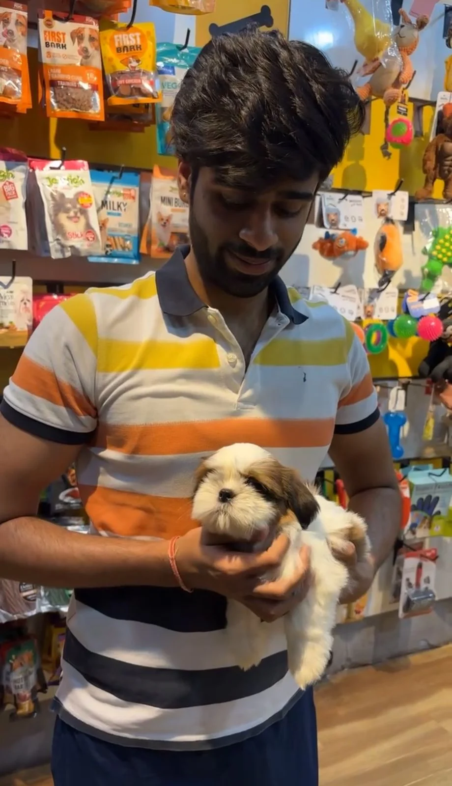 Happy customer with puppy at Kyra Pet Shop